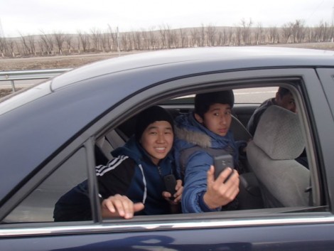 Standard experience in Kazakhstan; people slowing down to interview us whilst driving on the incredibly busy road!